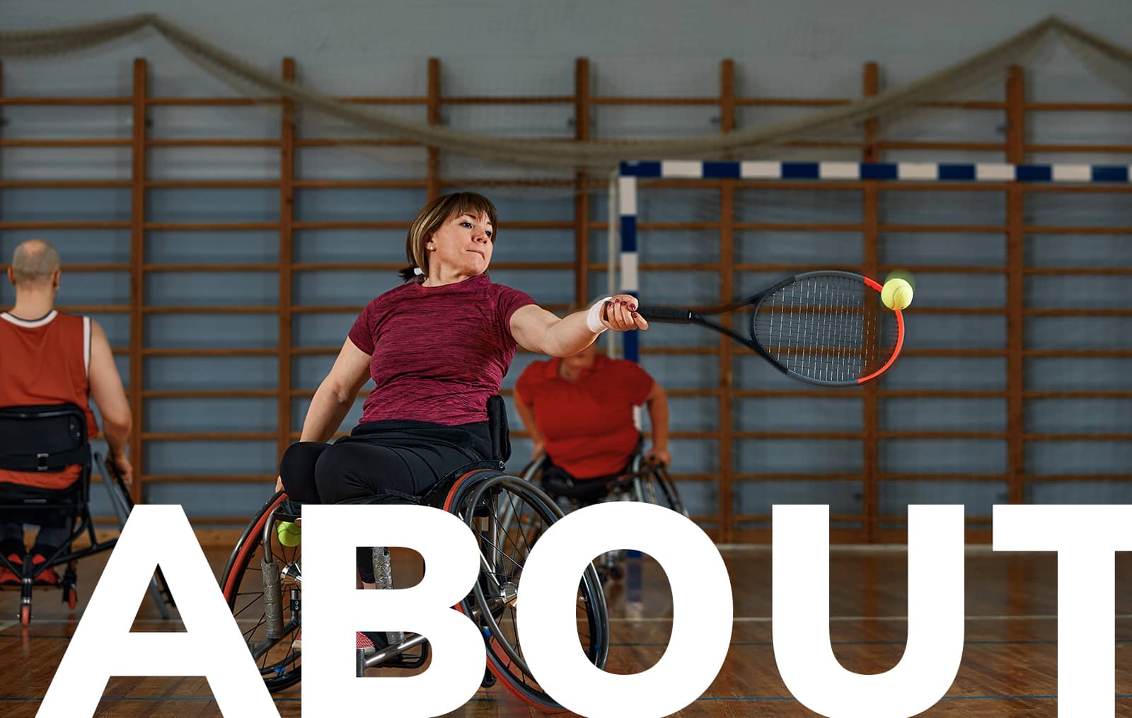 wheelchair tennis action shot returning a ball